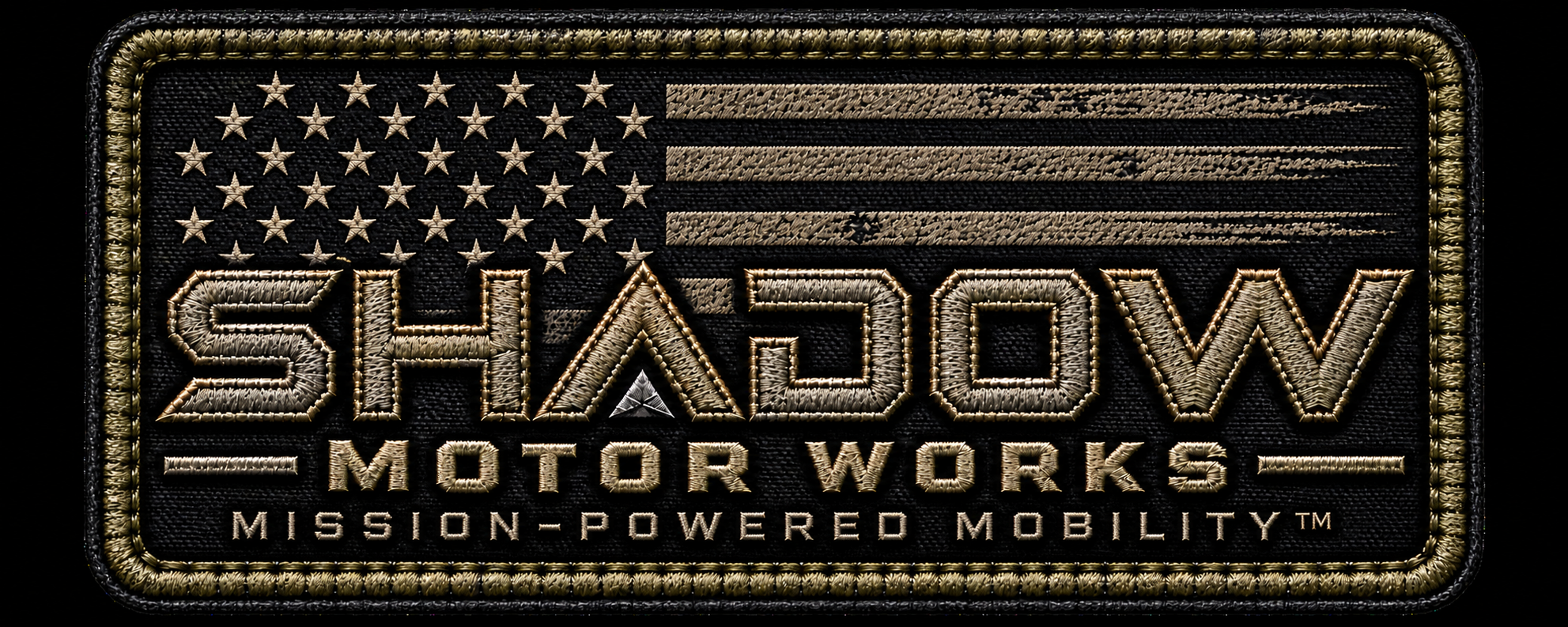 Gold embroidered Shadow Motor Works patch with American flag and Mission-Powered Mobility tagline